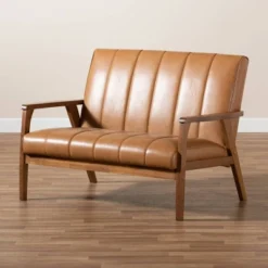 Nikko Mid-Century Faux Leather Upholstered Wood Loveseat Walnut/Brown - Baxton Studio 13 Nikko Mid-Century Faux Leather Upholstered Wood Loveseat Walnut/Brown - Baxton Studio -Baxton Studio Shop GUEST 523a5df4 2552 4576 a2e6 22ac3329118d