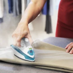 SteamFast 710 Mini Steam Iron: Travel Garment Iron With Folding Handle, 800W, Aluminum Soleplate, 2-Year Warranty