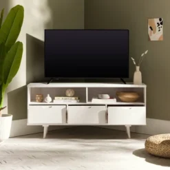 Cara Mid-Century Modern 3 Drawer Corner TV Stand For TVs Up To 58" - Saracina Home 38 Cara Mid-Century Modern 3 Drawer Corner TV Stand For TVs Up To 58" - Saracina Home -Baxton Studio Shop GUEST 99387a85 c456 4a52 b086 1c507b93c8b5