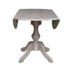 Kayden Round Dual Drop Leaf Pedestal Table Washed Gray Taupe - International Concepts -Baxton Studio Shop GUEST 9d3500b0 04b0 4709 a0db 0ecd00cdecf3