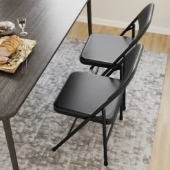 Whizmax Solo Classic Home Adult Modern Metal Indoor Auditorium Padded Folding Chairs, Black (Set Of 4) -Baxton Studio Shop GUEST ad5e5e6e cb23 4f3a 8c29 15344887bf16