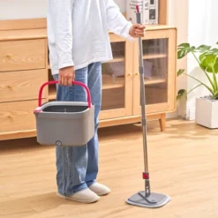 True & Tidy TrueClean Spin Mop & Bucket System With Silicone Sweeper 26 True & Tidy TrueClean Spin Mop & Bucket System With Silicone Sweeper -Baxton Studio Shop GUEST e1321459 c1db 4706 91ae 363edda9d4ac